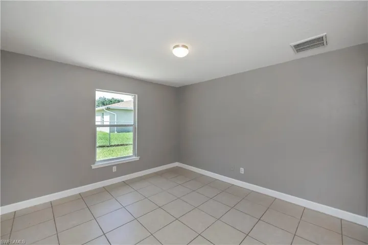 View of tiled empty room