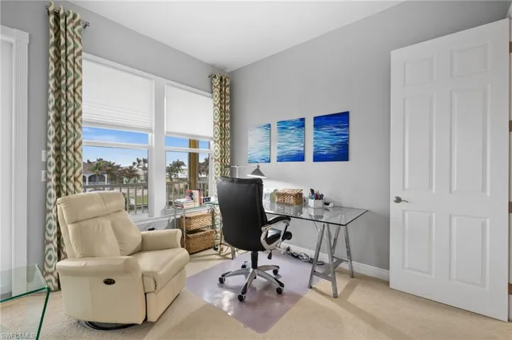 View of carpeted home office