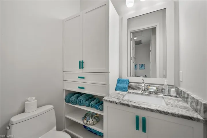 Bathroom with vanity and toilet
