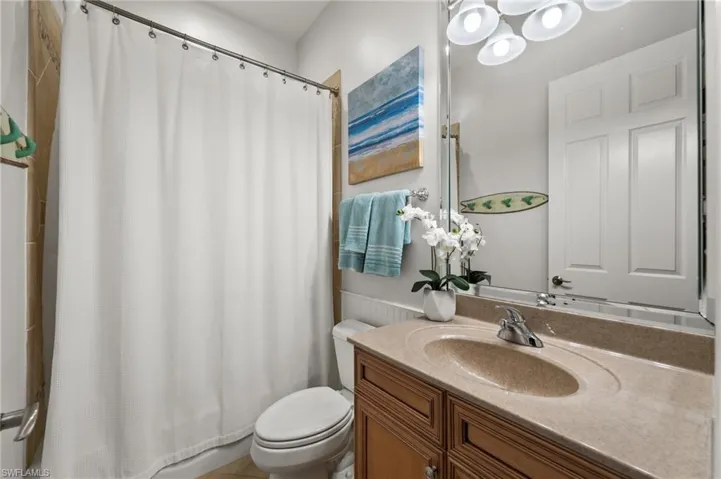 Bathroom featuring toilet and vanity