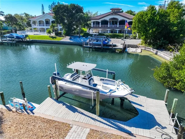 Dock with a water view and boat lift