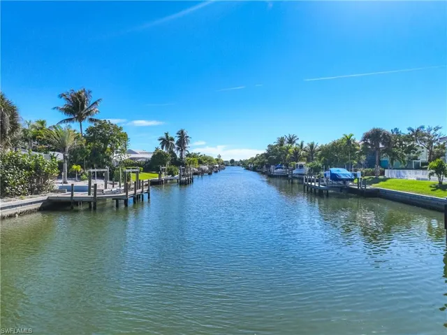 Water view featuring a dock
