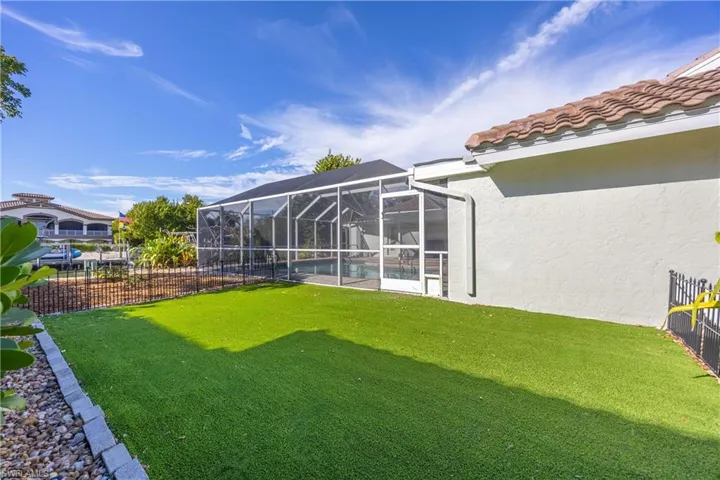 View of patio / terrace featuring outdoor dining space and a ceiling fan