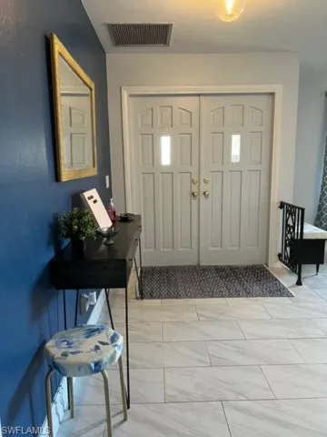 View of tiled entrance foyer