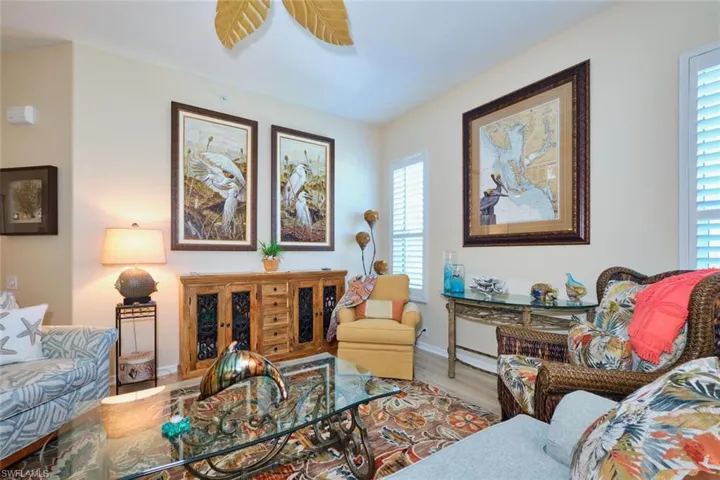 Living room with baseboards and wood finished floors