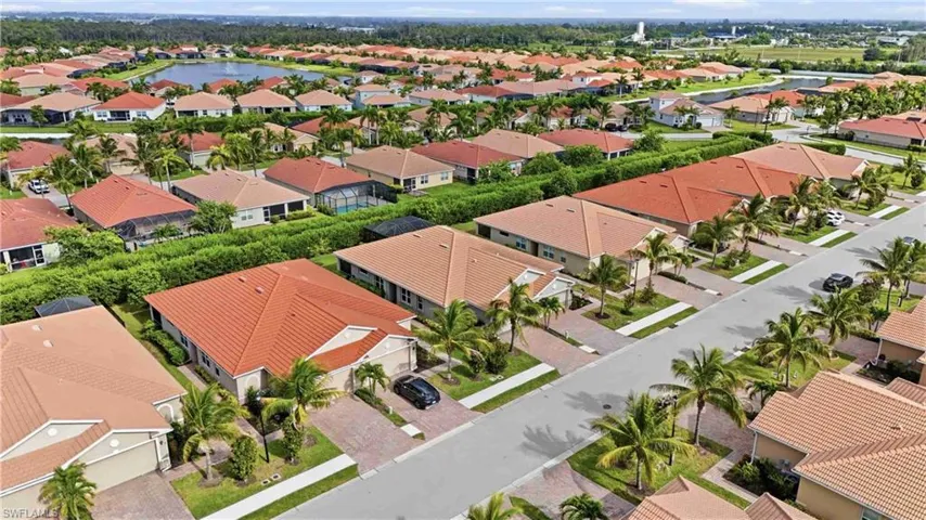 Aerial perspective showcasing residences featuring tile roofs