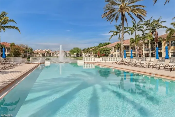 View of swimming pool featuring pool water feature