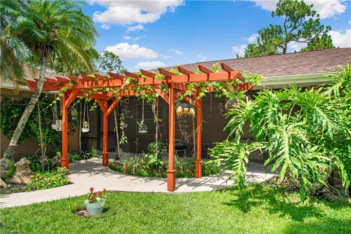 View of yard with a pergola