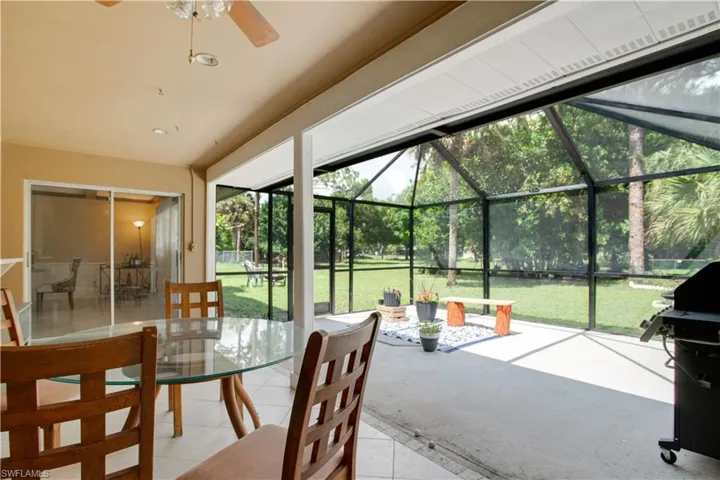 Sunroom featuring ceiling fan