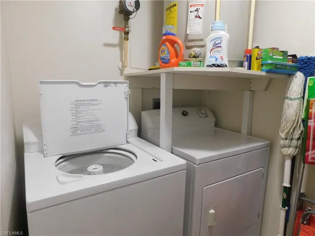 Clothes washing area with washer and dryer