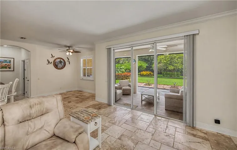Large Sliding Glass door to Oversized Screened Lanai