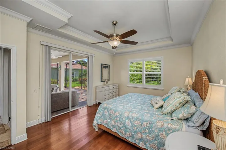 Primary Bedroom with Sliders to the Screened Lanai