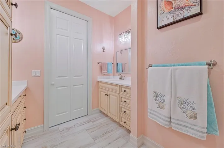 Bathroom featuring vanity and tile patterned floors