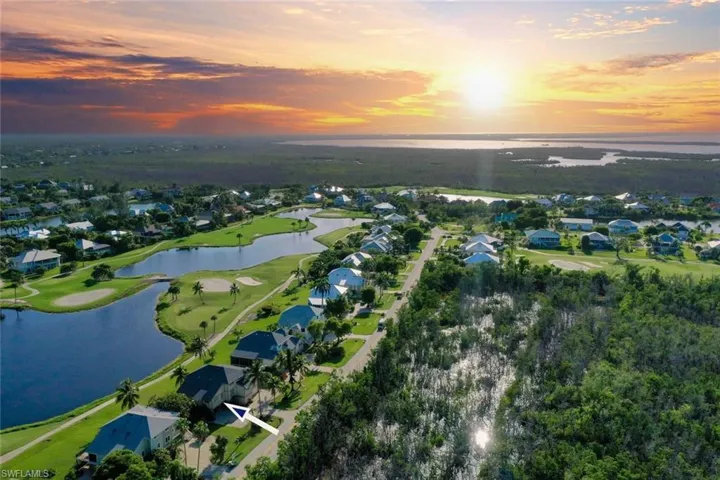 Aerial view of property and golf course