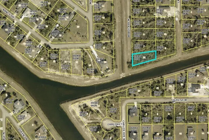Aerial map of property and surrounding area with property parcel outlined
