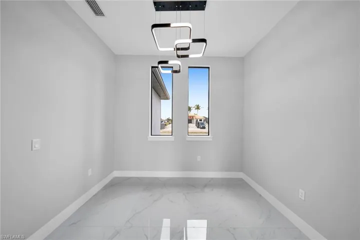 Unfurnished room featuring tile patterned flooring