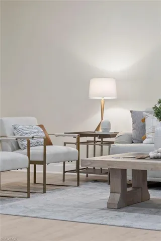 Living area with light wood-type flooring