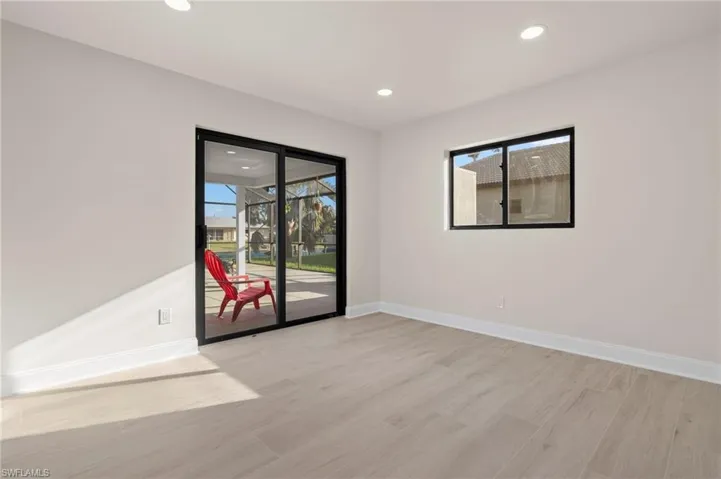 Unfurnished room with light wood-type flooring