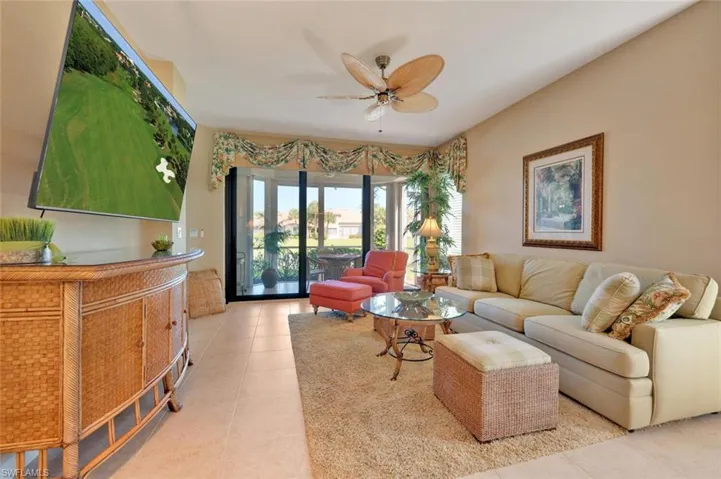 Tiled living room with ceiling fan