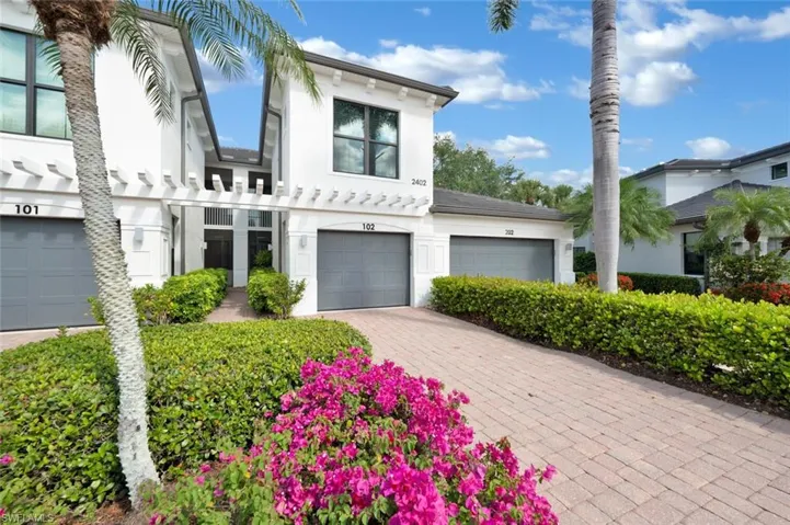 View of front of property featuring a garage.