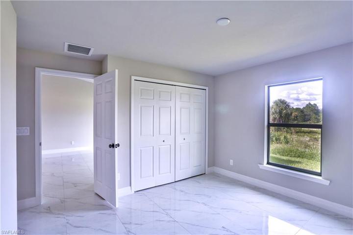 515-517  Meadow  RD, LEHIGH ACRES, FL 33973