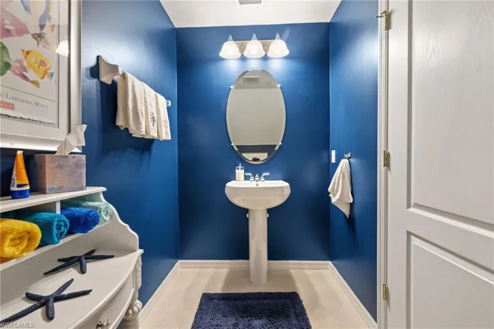 Bathroom with tile patterned floors