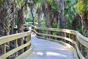 View of walking paths with wooden deck