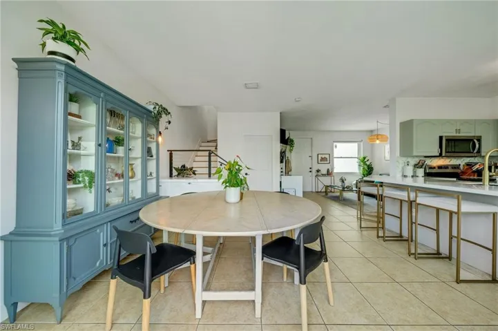 Dining room featuring light tile floors