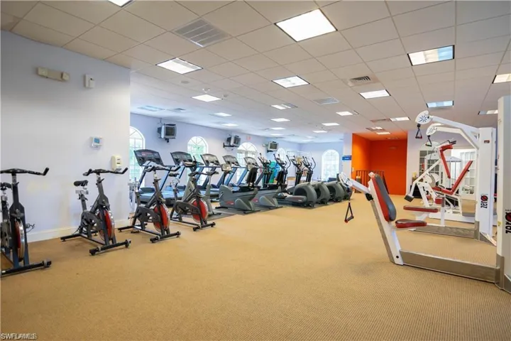 Exercise room featuring a drop ceiling