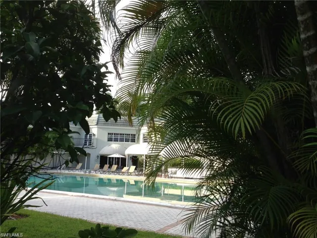 Community pool featuring a patio area