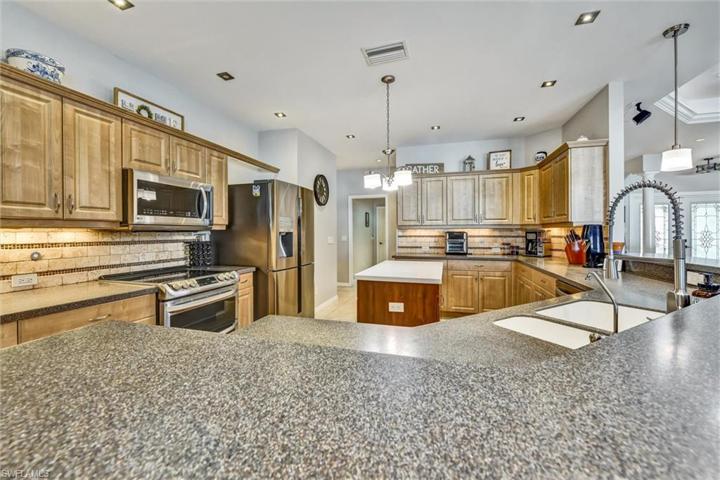 Modern Faucet/Stainless Steel Appliances/Plenty of Room for Food Prep