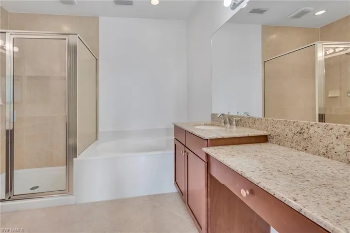 Great size master bath with separate sinks and makeup area.