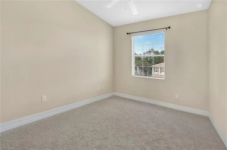 2nd guest bedroom with new carpeting.