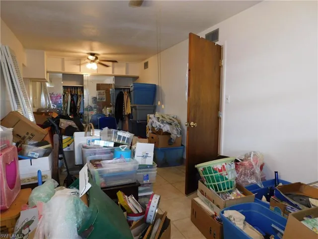 Storage with visible vents and ceiling fan