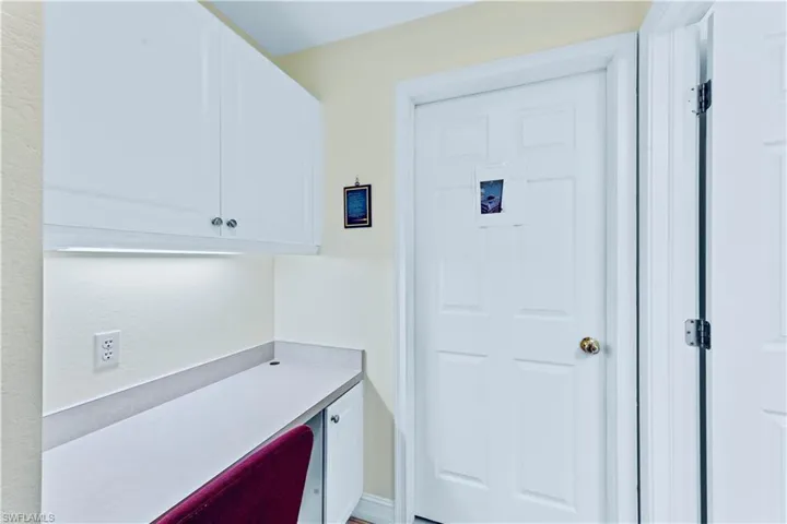 Clothes washing area featuring hookup for a washing machine