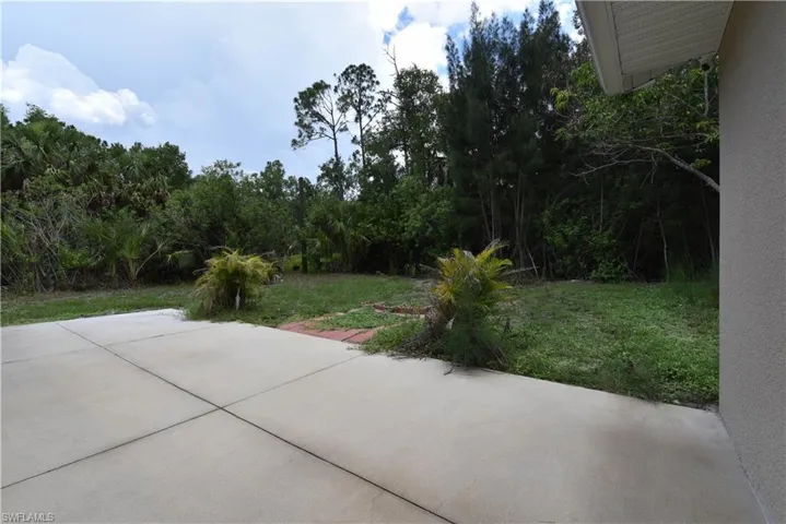 Expansive concrete patio with sections defined by control joints