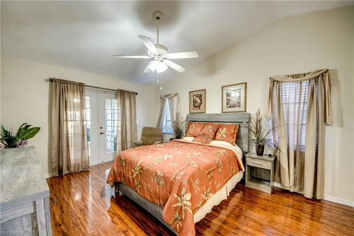 Bright bedroom with neutral finishes and natural light—comfortable space in SW Cape Coral.