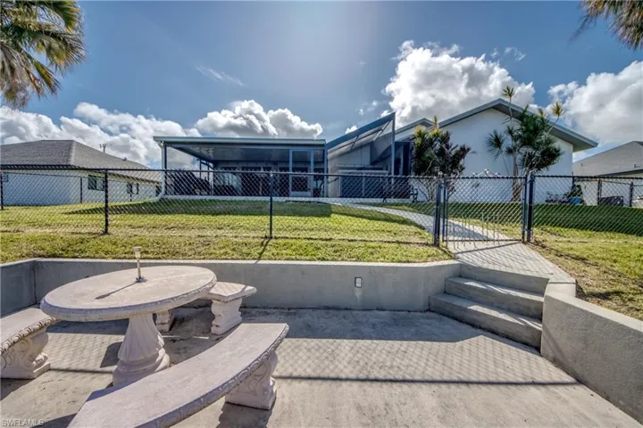 Dock surroundings and outdoor lounge space overlooking the freshwater canal in Cape Coral.