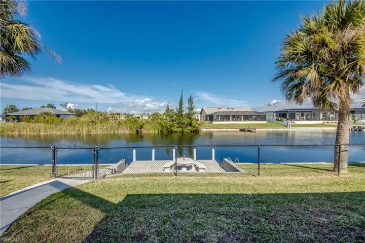 Backyard view overlooking a peaceful freshwater canal—a true Cape Coral waterfront setting.