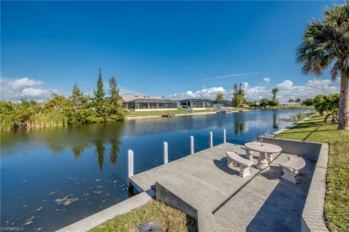 Private dock on the freshwater canal—enjoy fishing, kayaking, and Cape Coral waterfront living.