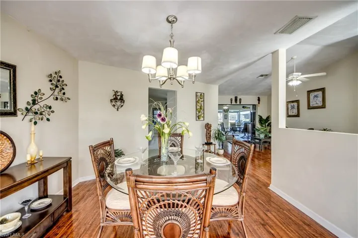 Alternate dining room angle showing spacious layout and connection to living areas.