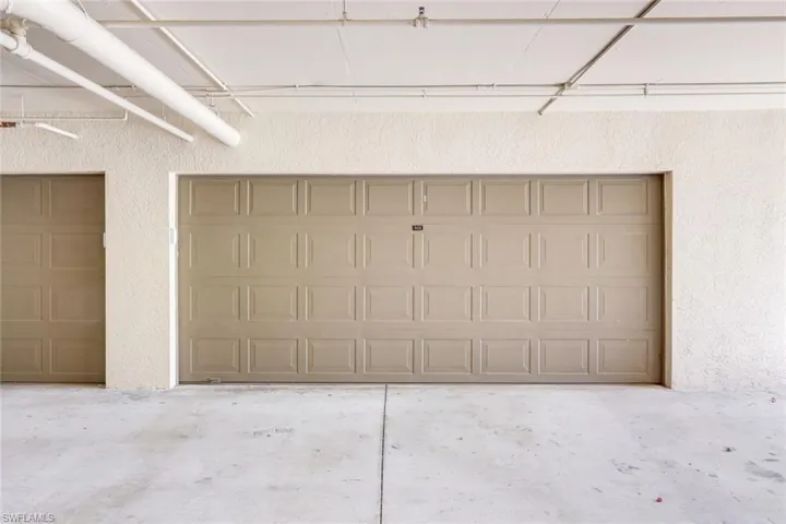 Large Oversized Two (2) Car Garage Under the Building..With Bike Racks..