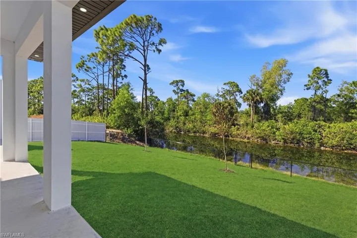 Fenced yard with a patio area