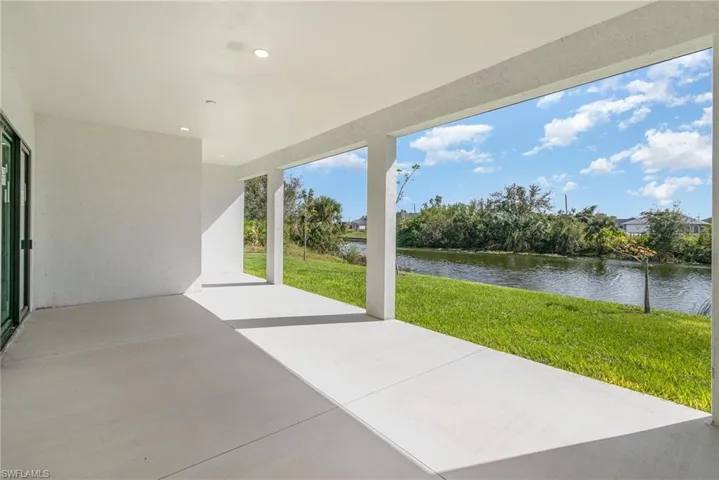 View of patio / terrace with a water view