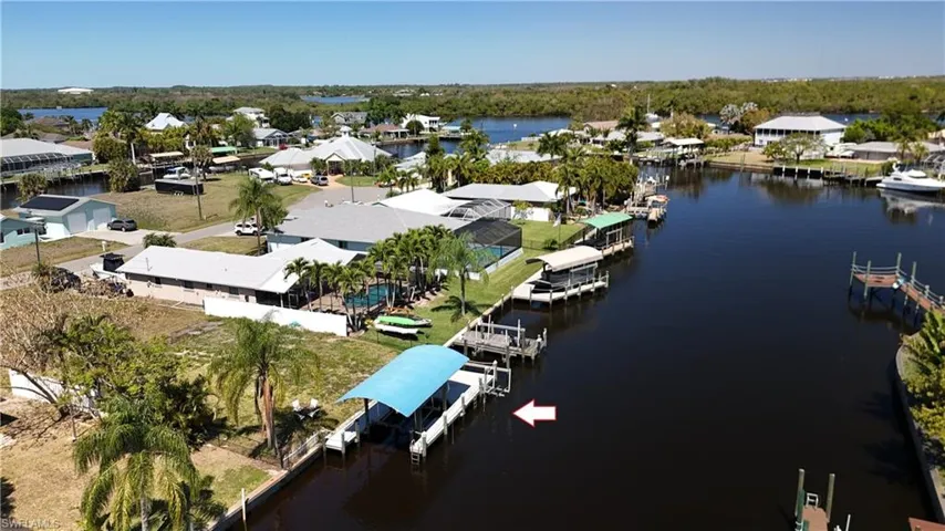 Aerial view of residential area with a nearby body of water