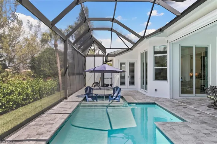 Pool has lounging platform within