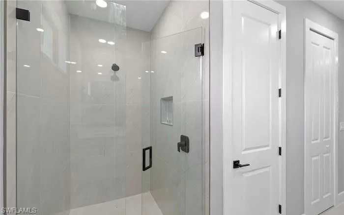 Bathroom with an enclosed shower
