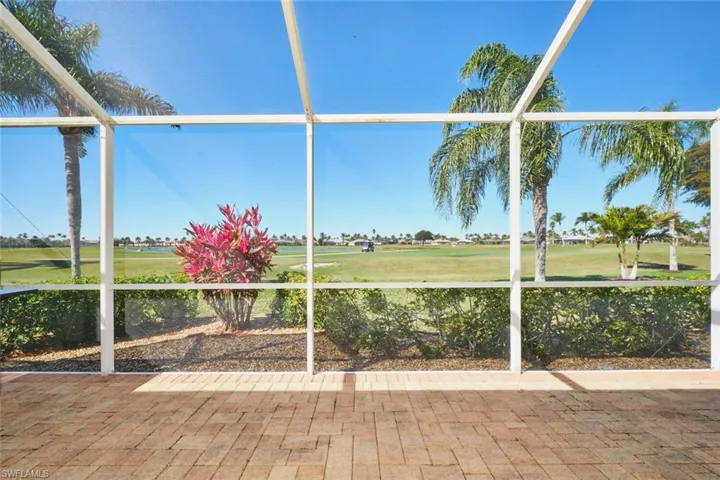 Unfurnished sunroom with golf course view