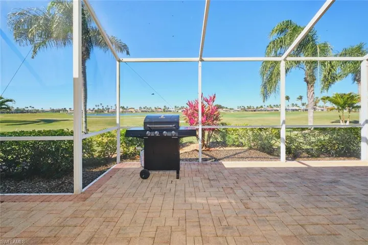 Unfurnished sunroom with view of golf course