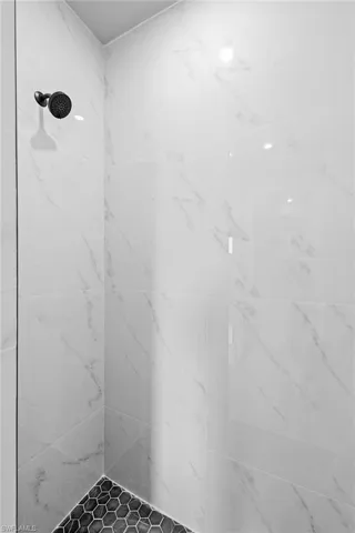 Bathroom with a tile shower